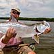 Bill MOrris with a nice baby tarpon on fly