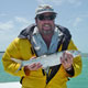 Johnny with a spring time bonefish caught in Marathon on a blustery day
