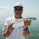 Joe with a Bonefish caught in slick calm conditions.
